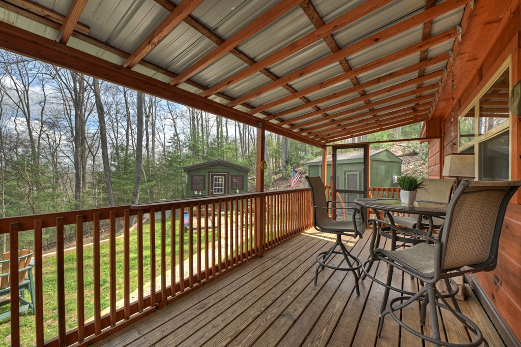 57 Meadow Hill Morganton, GA 30560 - Photo 54 of 59 a view of balcony with furniture and wooden deck