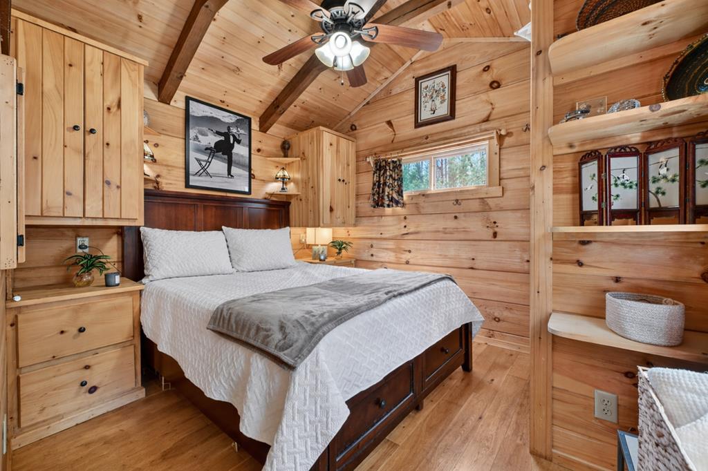 57 Meadow Hill Morganton, GA 30560 - Photo 6 of 59 a spacious bedroom with a bed and a dresser