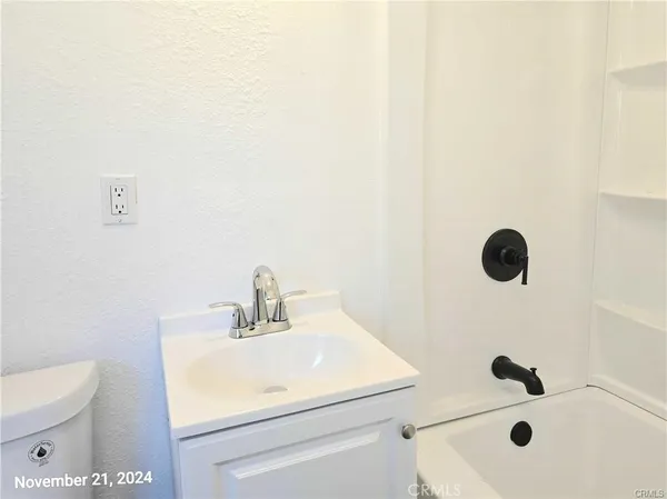 a bathroom with a sink and a toilet