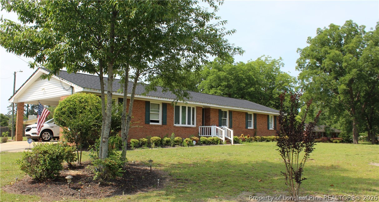 front view of house with a yard