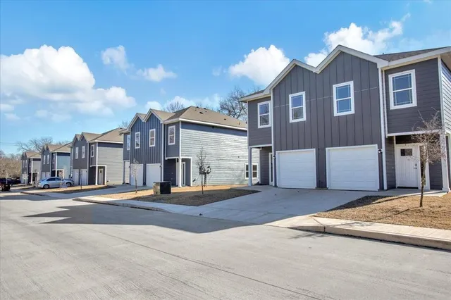 a view of a building with a street