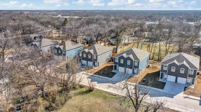 a view of house with yard