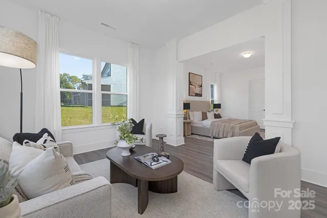 a view of a livingroom with furniture and window