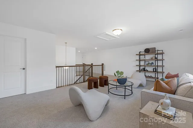 a view of room with wooden floor