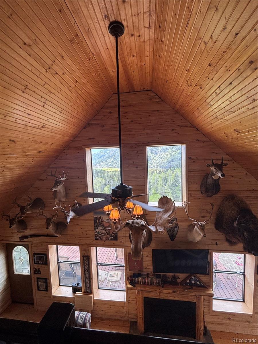 1113 Spring Street Del Norte, CO 81132 - Photo 11 of 45 a room with furniture and window