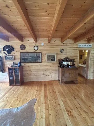 an empty room with a fireplace