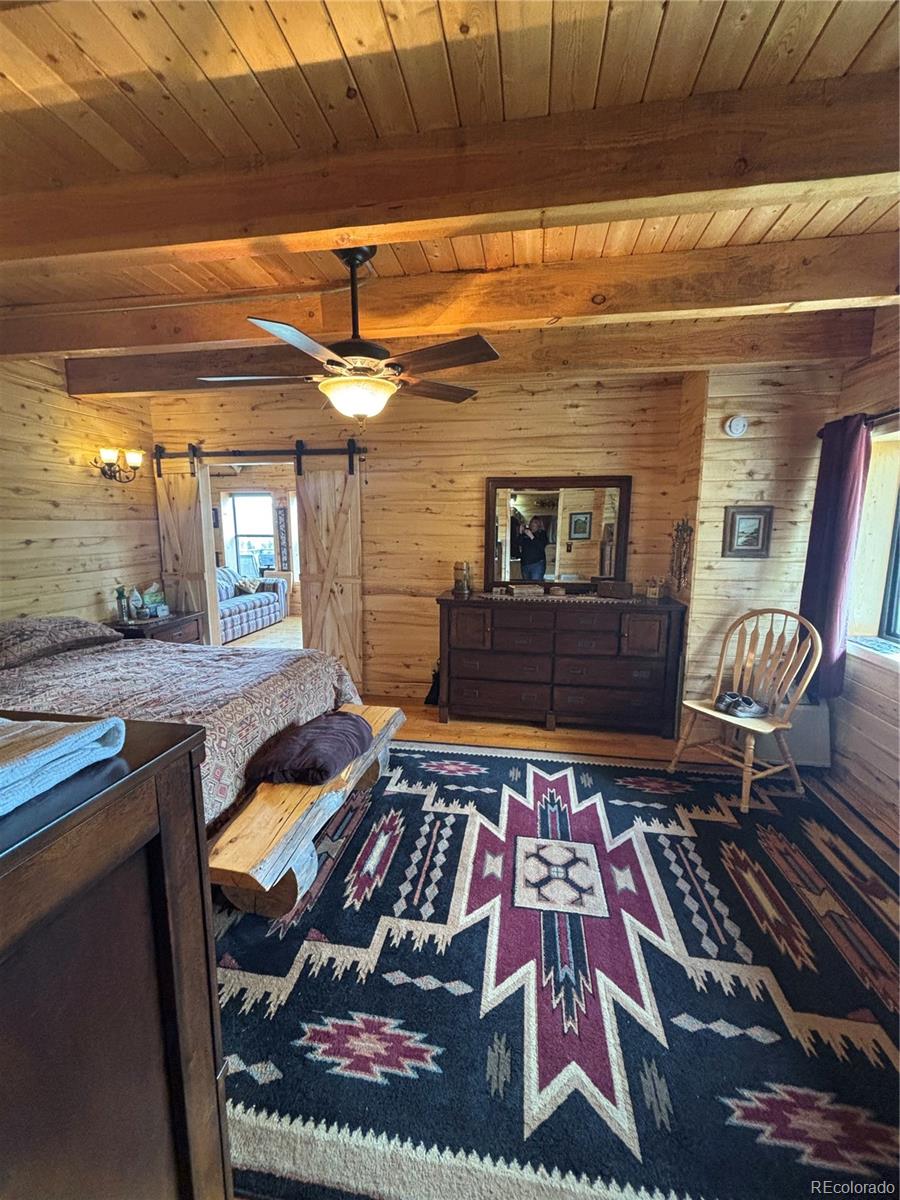 1113 Spring Street Del Norte, CO 81132 - Photo 34 of 45 a very nice looking room with a rug