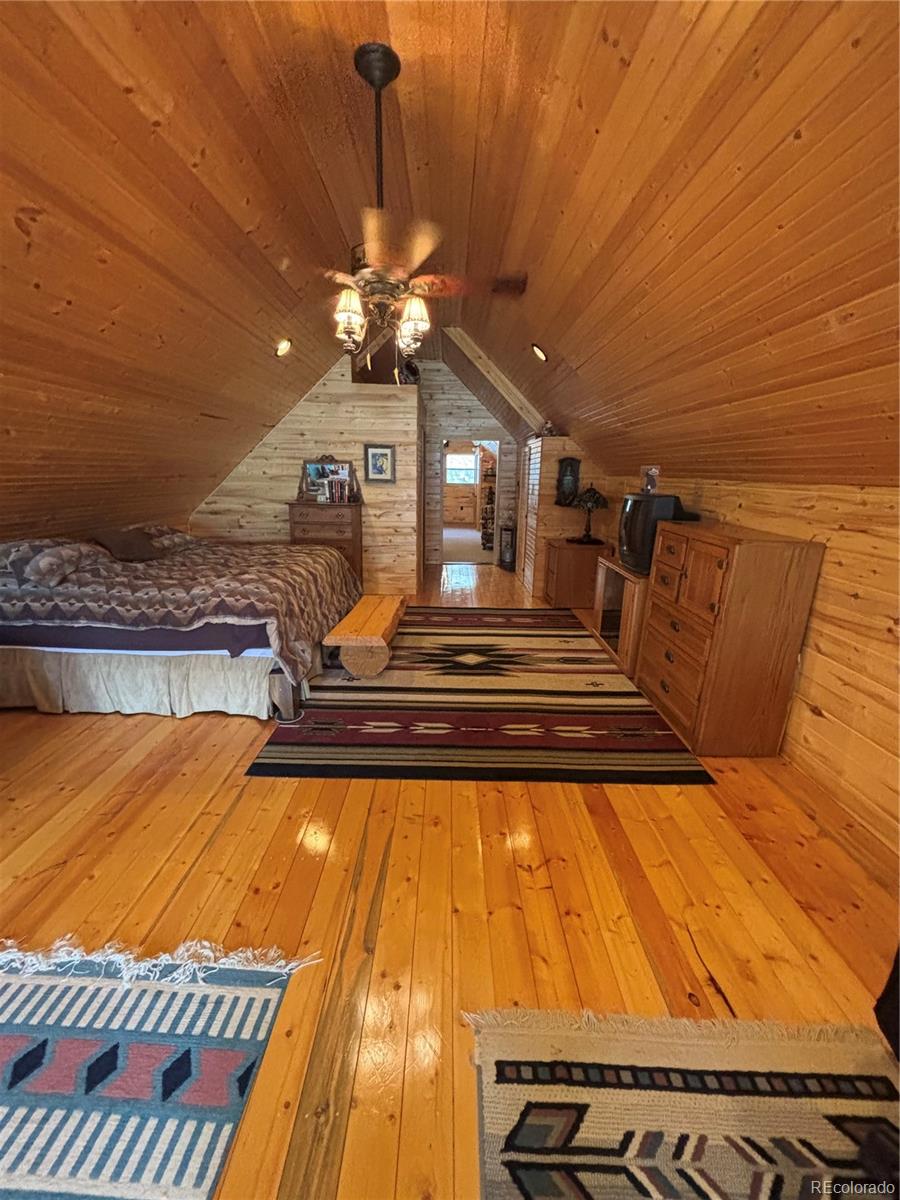1113 Spring Street Del Norte, CO 81132 - Photo 37 of 45 a view of a living room with a balcony