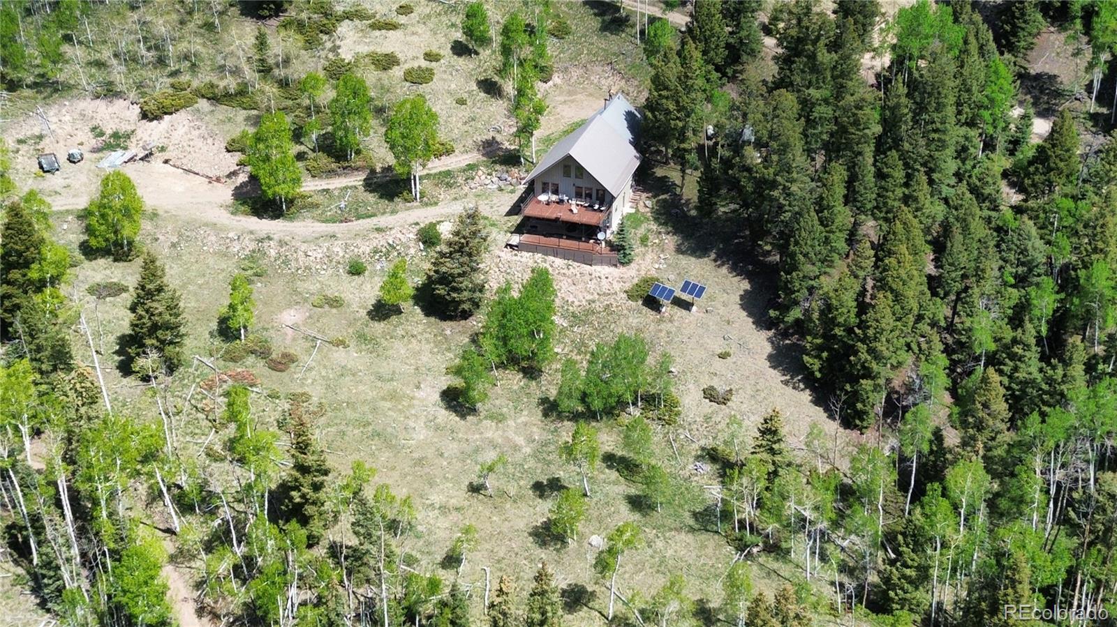 1113 Spring Street Del Norte, CO 81132 - Photo 40 of 45 an aerial view of house with yard