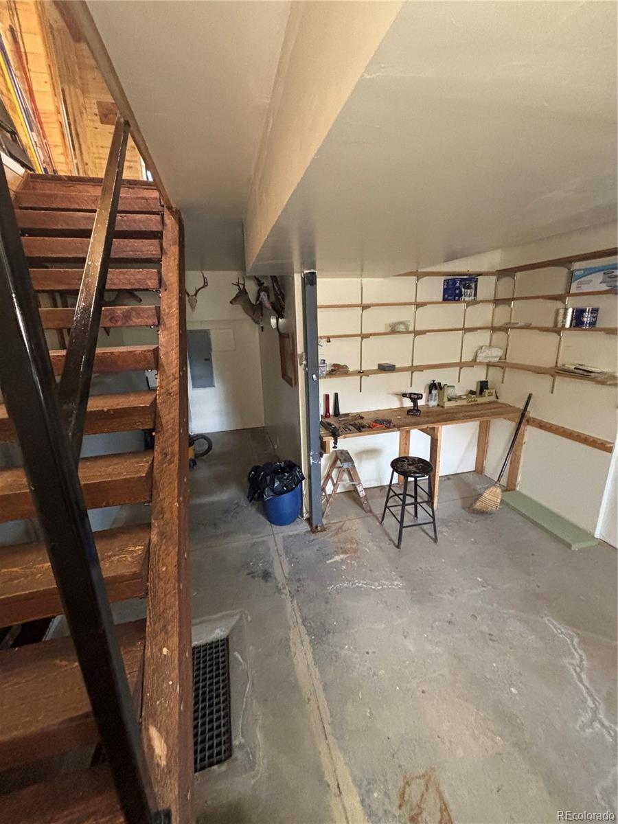 1113 Spring Street Del Norte, CO 81132 - Photo 42 of 45 a view of livingroom with furniture and stairs