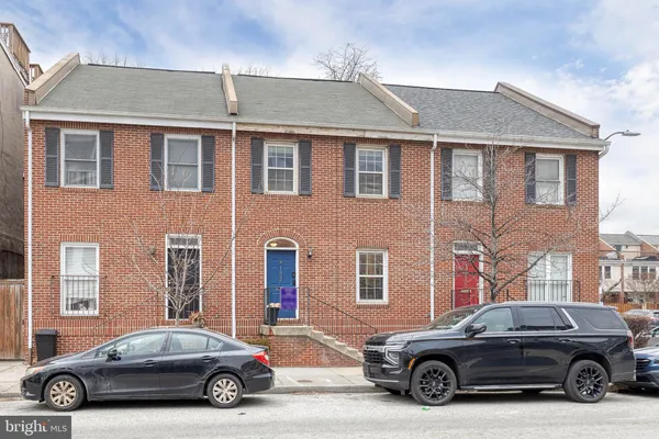a car parked in front of a house