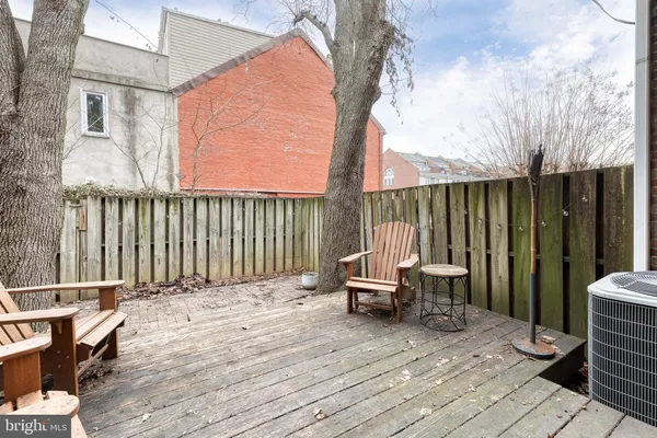 a view of a two chairs on the roof deck