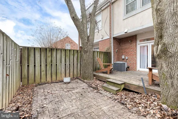 a house with trees in front of it