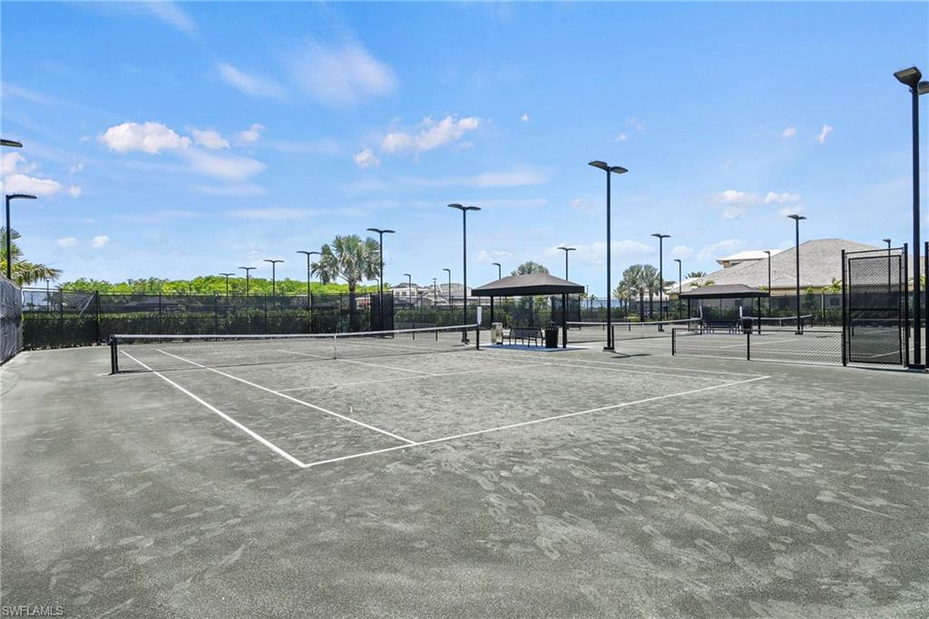 15245 Zeno Way, Unit 101 Naples, FL 34114 - Photo 40 of 46 a view of a tennis court
