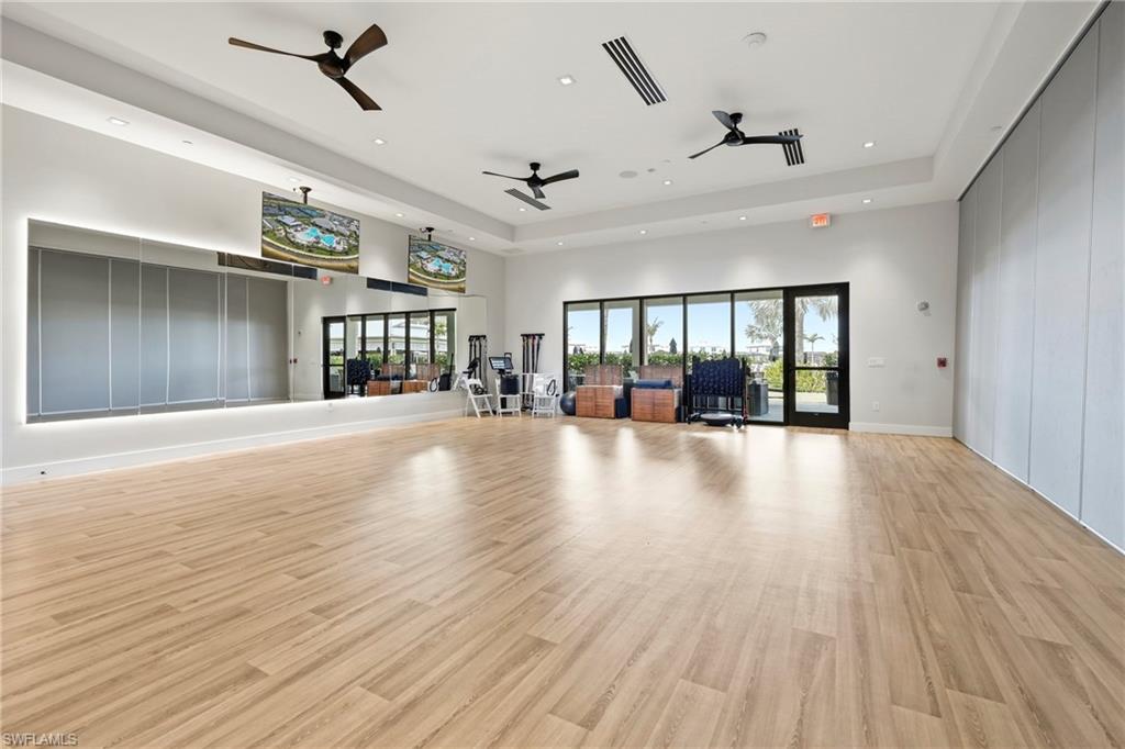 15245 Zeno Way, Unit 101 Naples, FL 34114 - Photo 45 of 46 a view of livingroom and hardwood floor