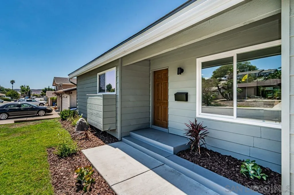 12710 McFeron Road Poway, CA 92064 - Photo 3 of 35 a front view of a house with garden