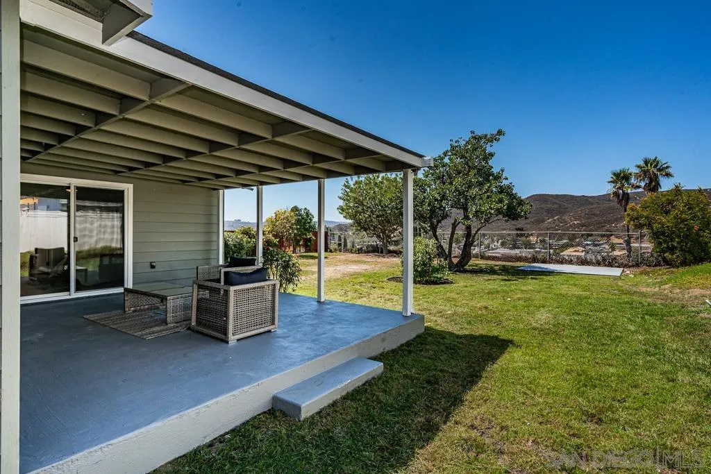 12710 McFeron Road Poway, CA 92064 - Photo 8 of 35 a view of a backyard with sitting area
