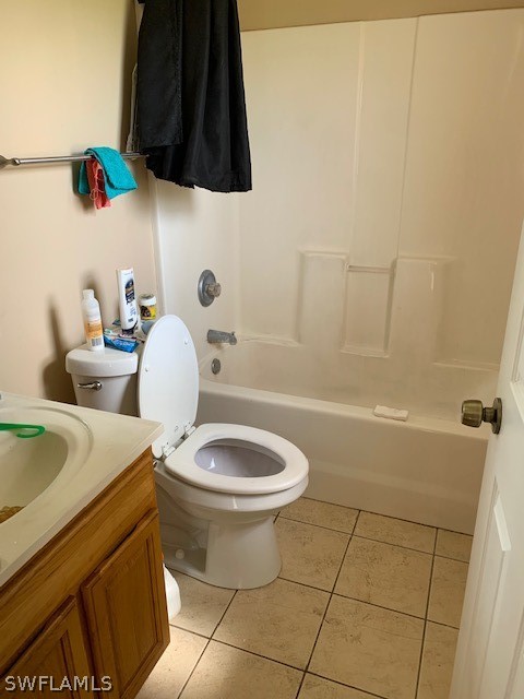 3206 51st Street West Lehigh Acres, FL 33971 - Photo 11 of 20 a bathroom with a sink a toilet and bathtub