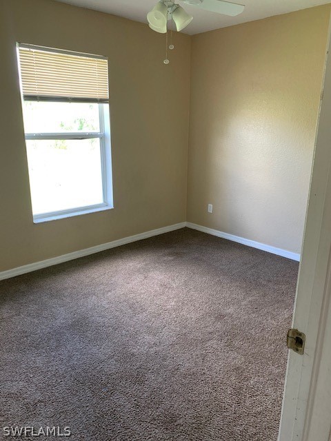 3206 51st Street West Lehigh Acres, FL 33971 - Photo 14 of 20 an empty room with a window