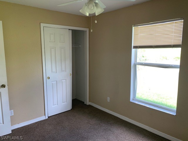3206 51st Street West Lehigh Acres, FL 33971 - Photo 15 of 20 a view of an empty room with a window