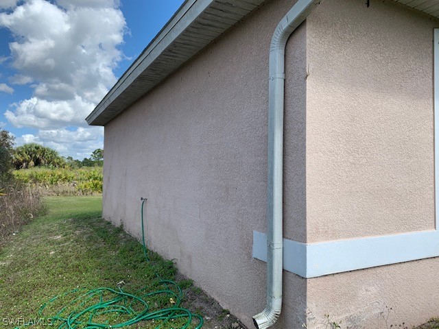 3206 51st Street West Lehigh Acres, FL 33971 - Photo 16 of 20 a view of a backyard