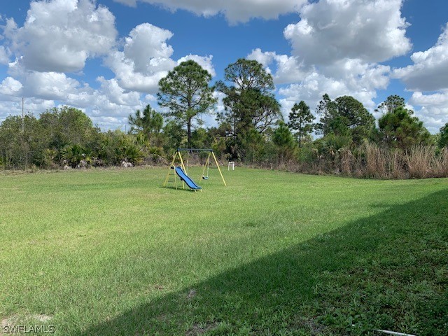 3206 51st Street West Lehigh Acres, FL 33971 - Photo 17 of 20 a view of a entertaining space