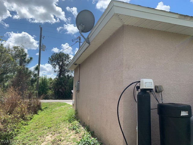 3206 51st Street West Lehigh Acres, FL 33971 - Photo 20 of 20 a view of cabinets and outdoor seating