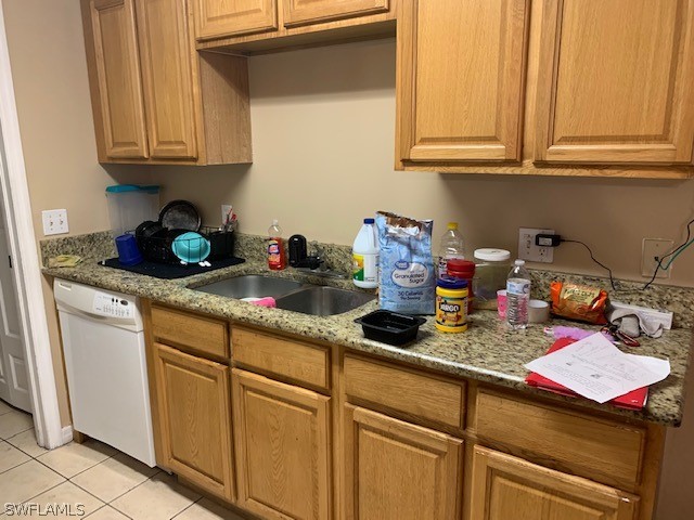 3206 51st Street West Lehigh Acres, FL 33971 - Photo 5 of 20 a kitchen with stainless steel appliances granite countertop a sink and cabinets