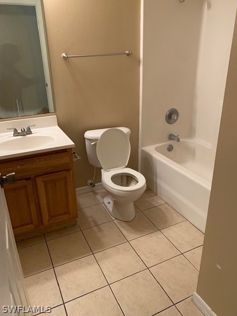 3206 51st Street West Lehigh Acres, FL 33971 - Photo 8 of 20 a bathroom with a sink toilet and mirror