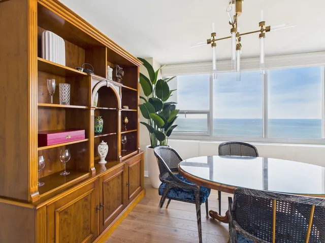 a view of balcony and wooden floor