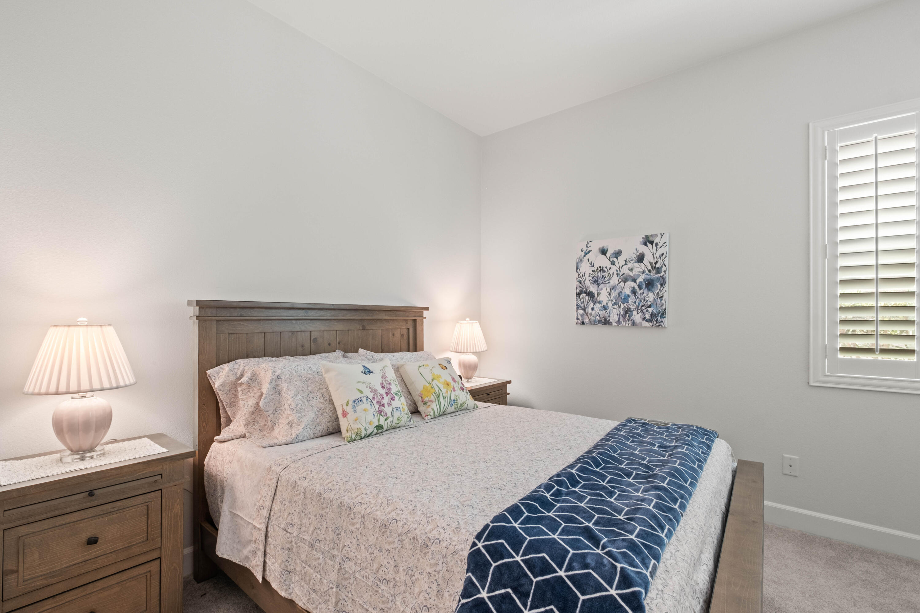 81360 Corte Compras Indio, CA 92203 - Photo 19 of 24 a bedroom with a bed and a lamp on dresser