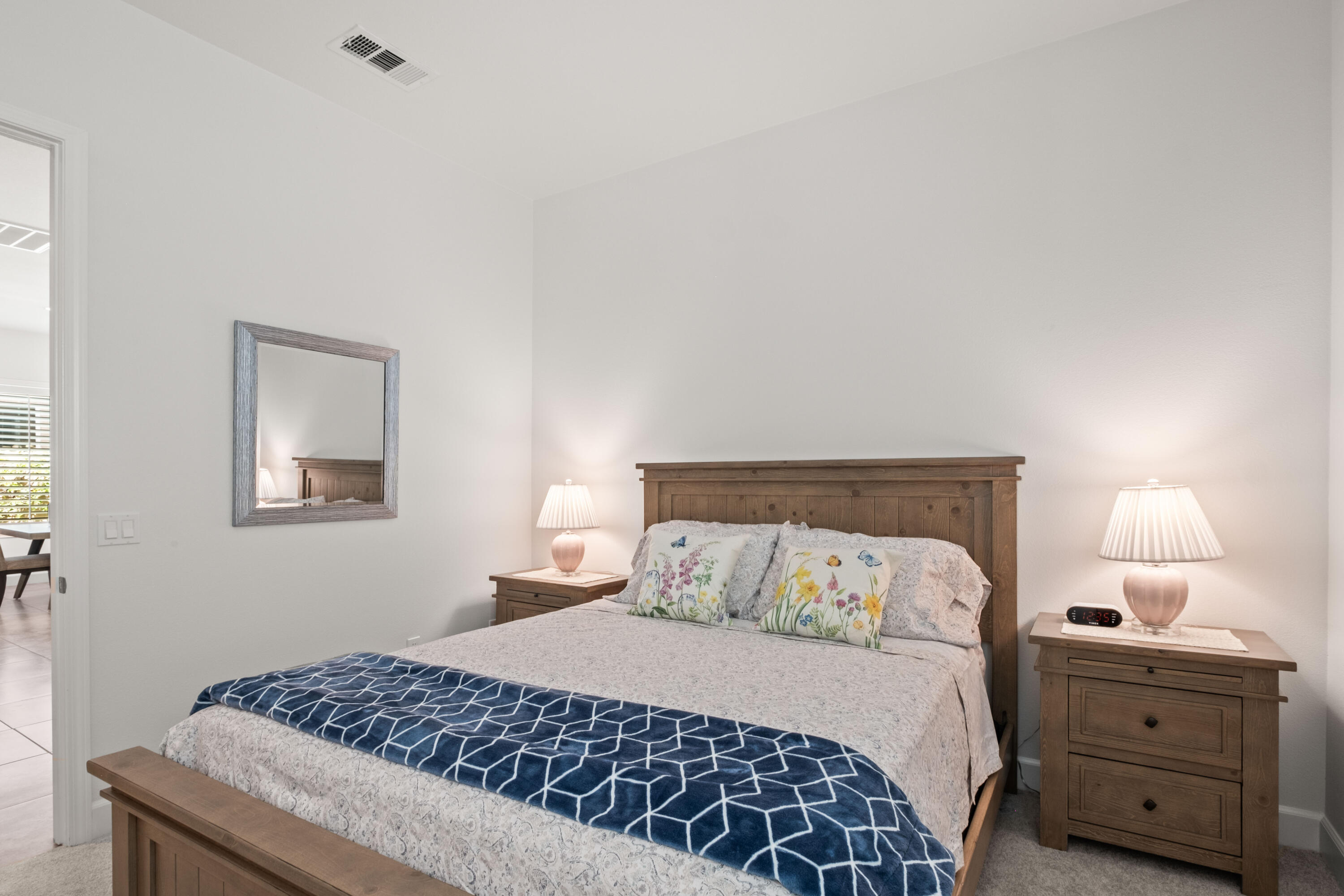 81360 Corte Compras Indio, CA 92203 - Photo 20 of 24 a bedroom with a bed and a lamp