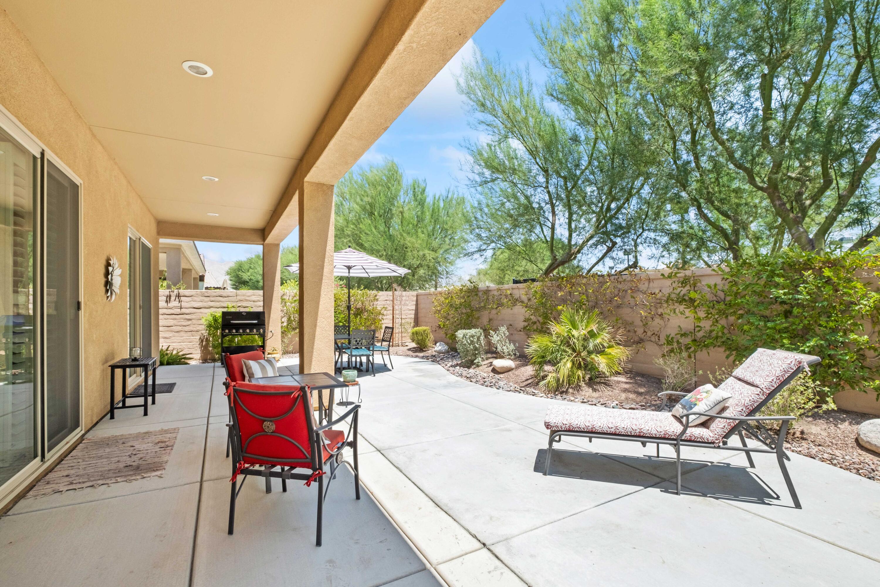 81360 Corte Compras Indio, CA 92203 - Photo 24 of 24 a building outdoor space with patio furniture and potted plants