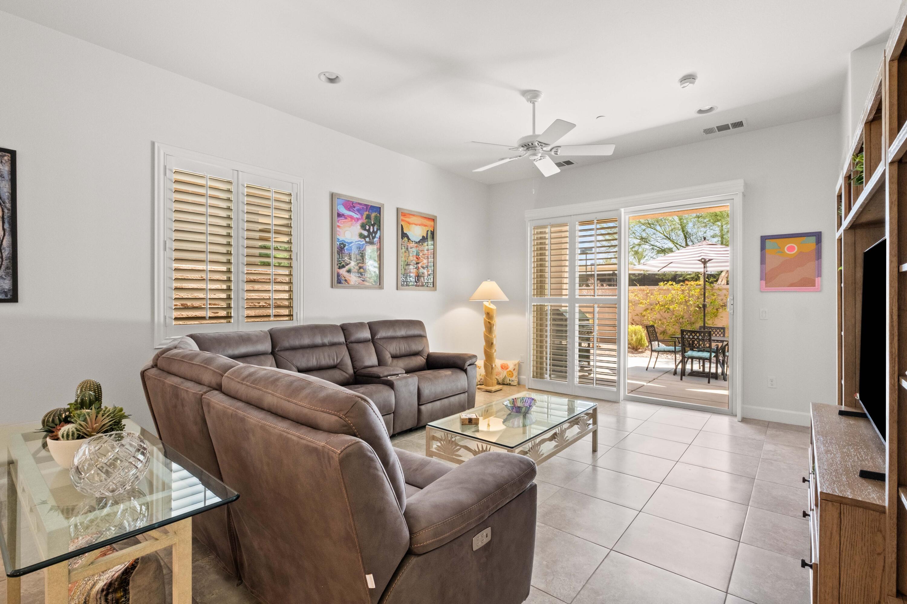 81360 Corte Compras Indio, CA 92203 - Photo 4 of 24 a living room with furniture and a flat screen tv