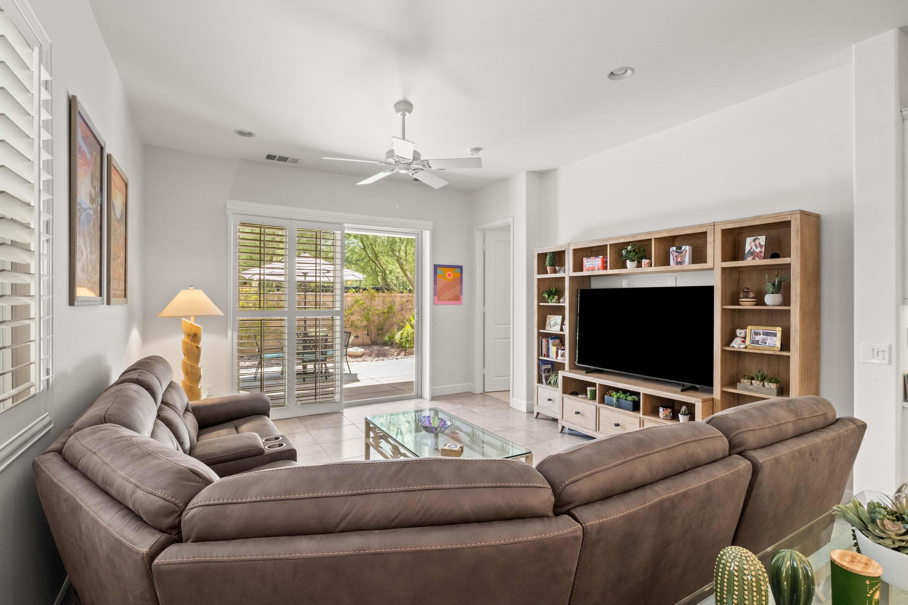 81360 Corte Compras Indio, CA 92203 - Photo 5 of 24 a living room with furniture and a flat screen tv