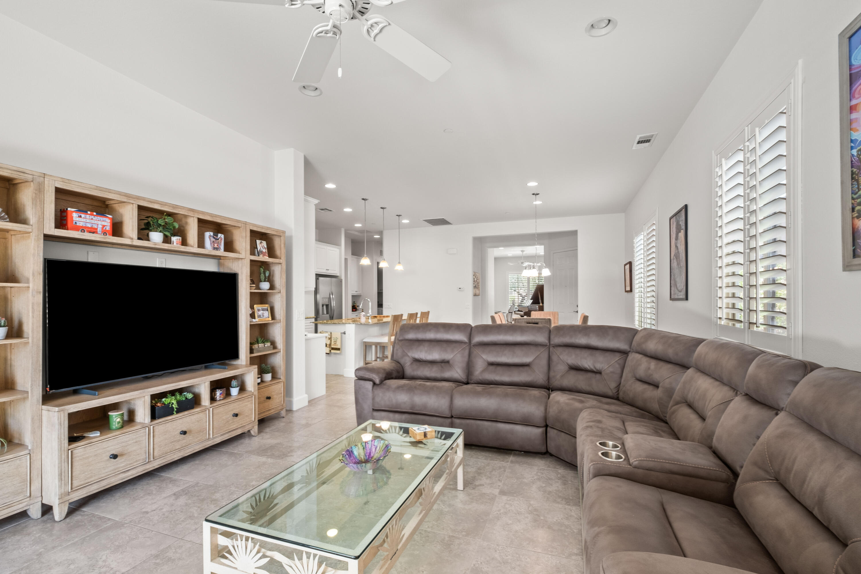 81360 Corte Compras Indio, CA 92203 - Photo 6 of 24 a living room with furniture and a flat screen tv