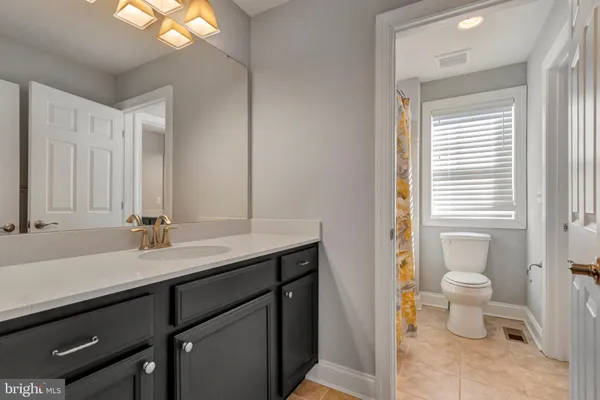 a view of an empty room with a shower