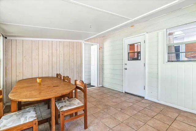 a workspace with furniture and window