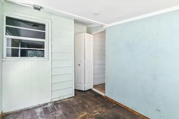 an empty room with closet