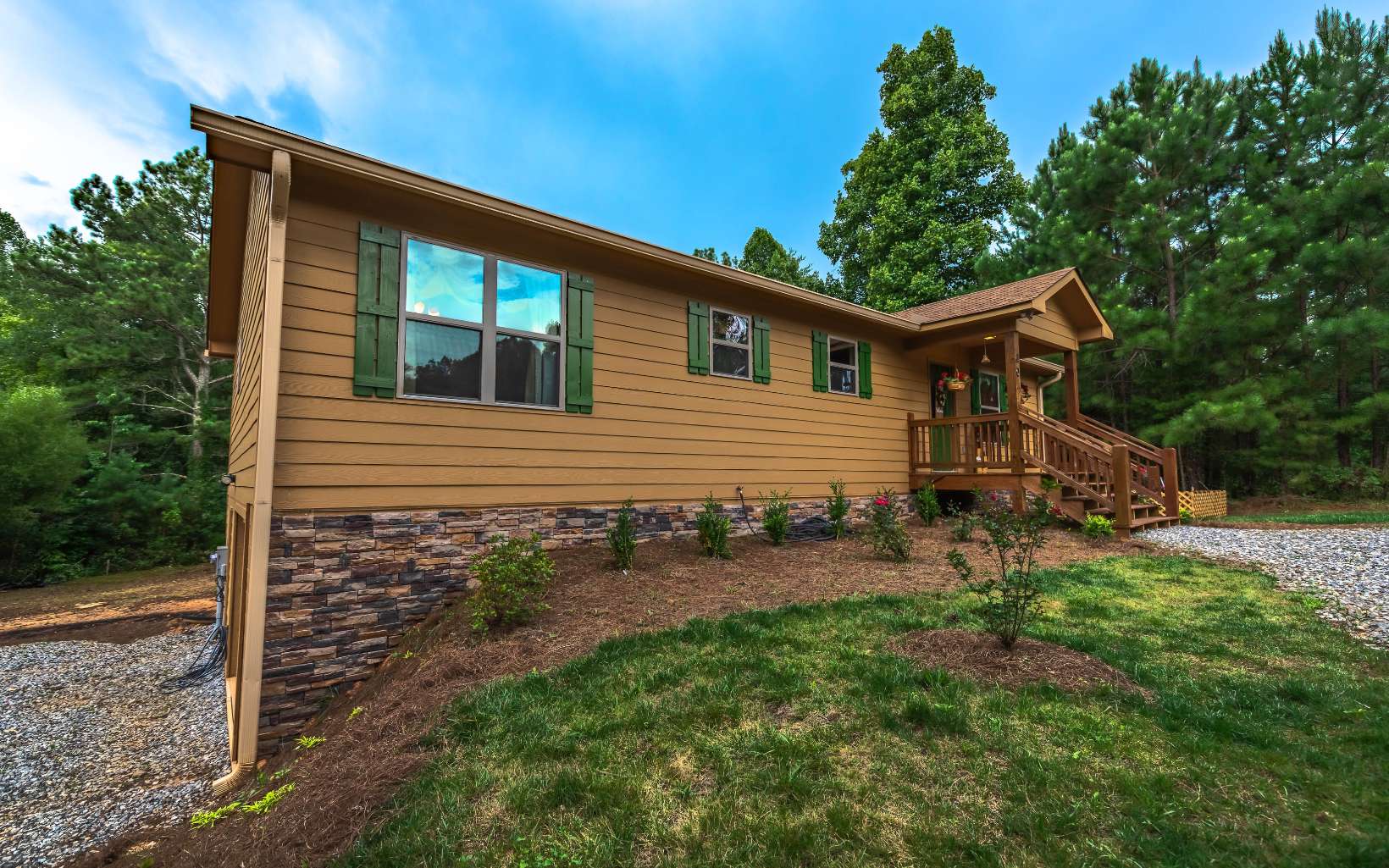 20 Bevan Lane East Blue Ridge, GA 30513 - Photo 1 of 1 a front view of a house with yard and green space