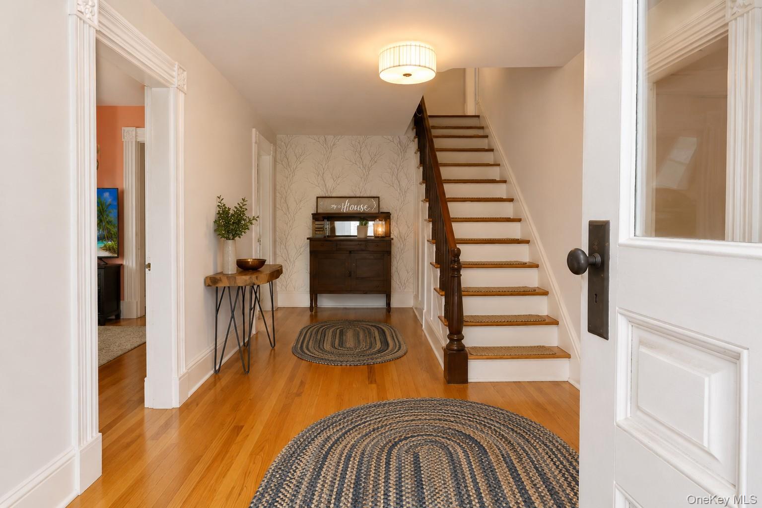 340 Dunn Road Montgomery, NY 12549 - Photo 3 of 34 Enter to the foyer with hard wood flooring and center stairway
