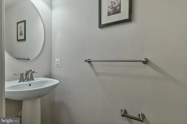 a bathroom with a tub and shower
