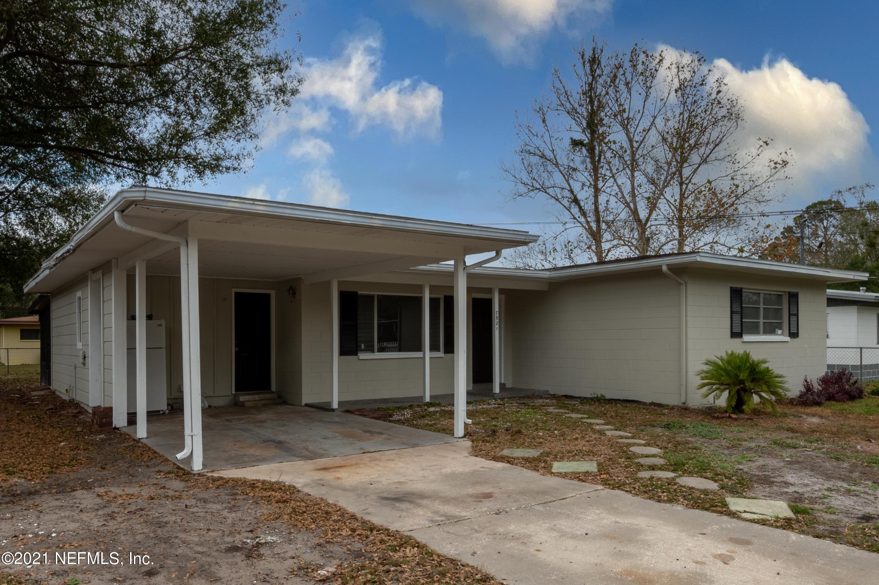 7521 Strato Road Jacksonville, FL 32210 - Photo 24 of 40 a house with a outdoor space