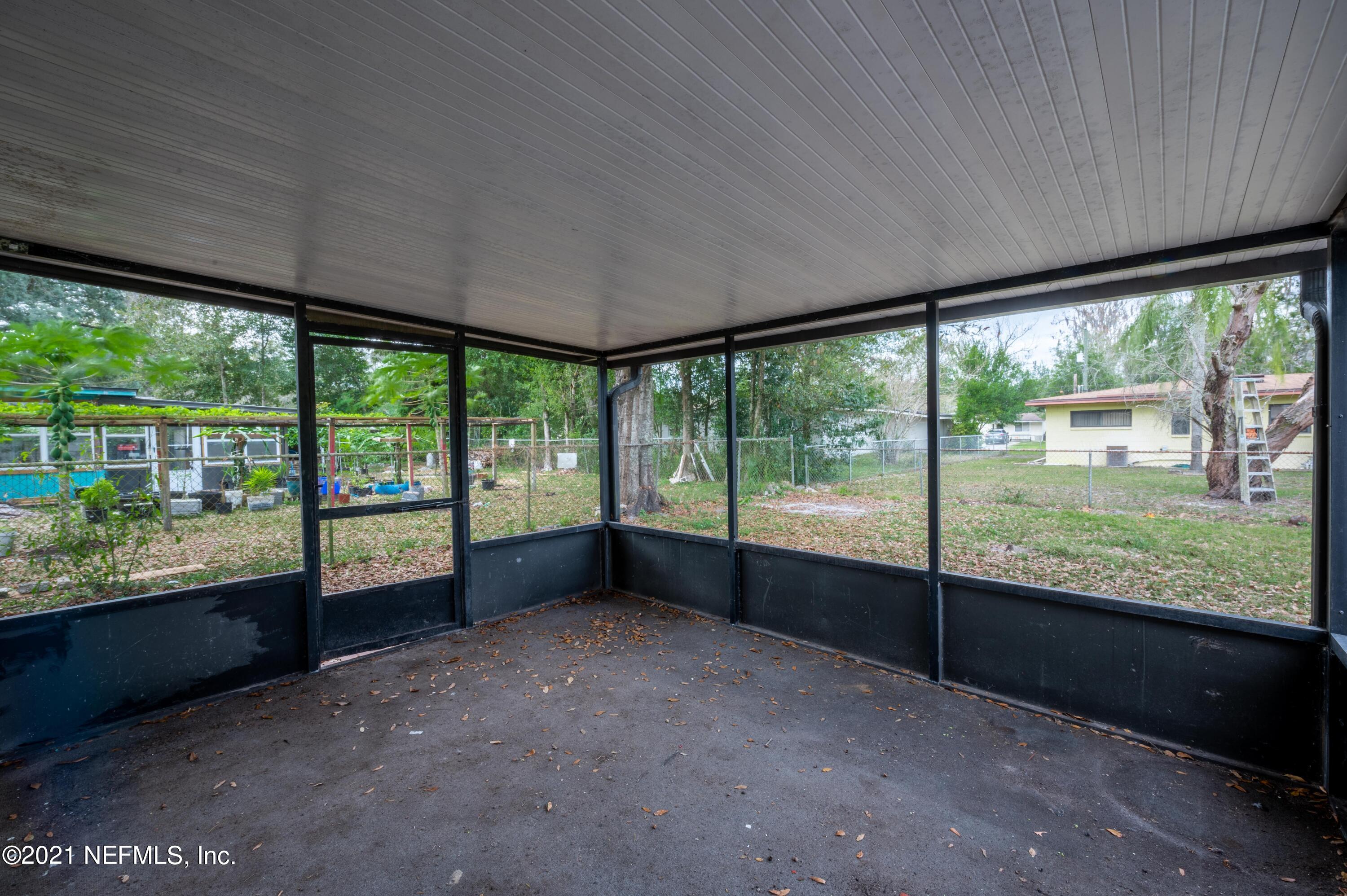 7521 Strato Road Jacksonville, FL 32210 - Photo 32 of 40 a view of an empty room with a large window