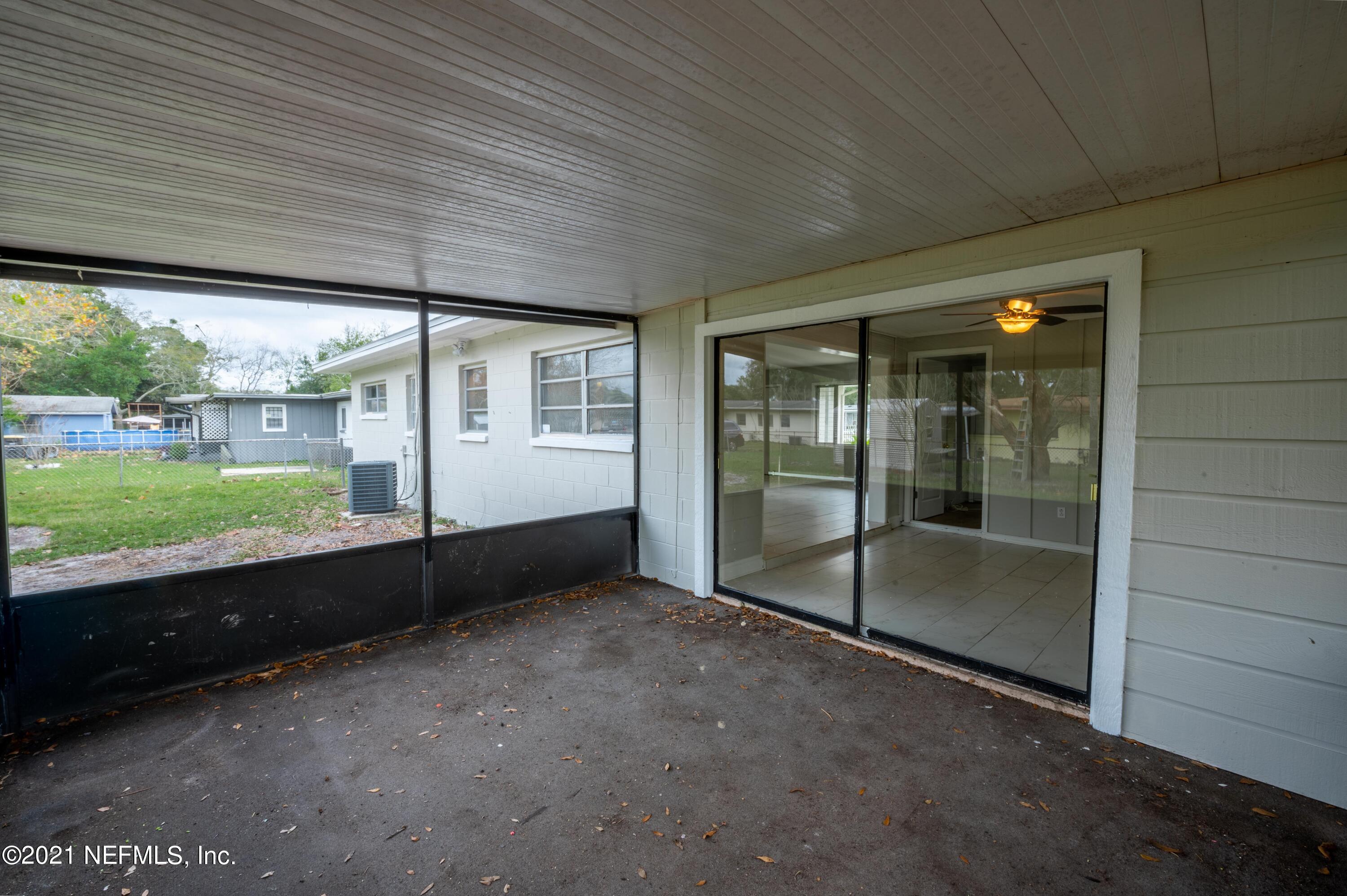 7521 Strato Road Jacksonville, FL 32210 - Photo 34 of 40 a view of an empty room with a window