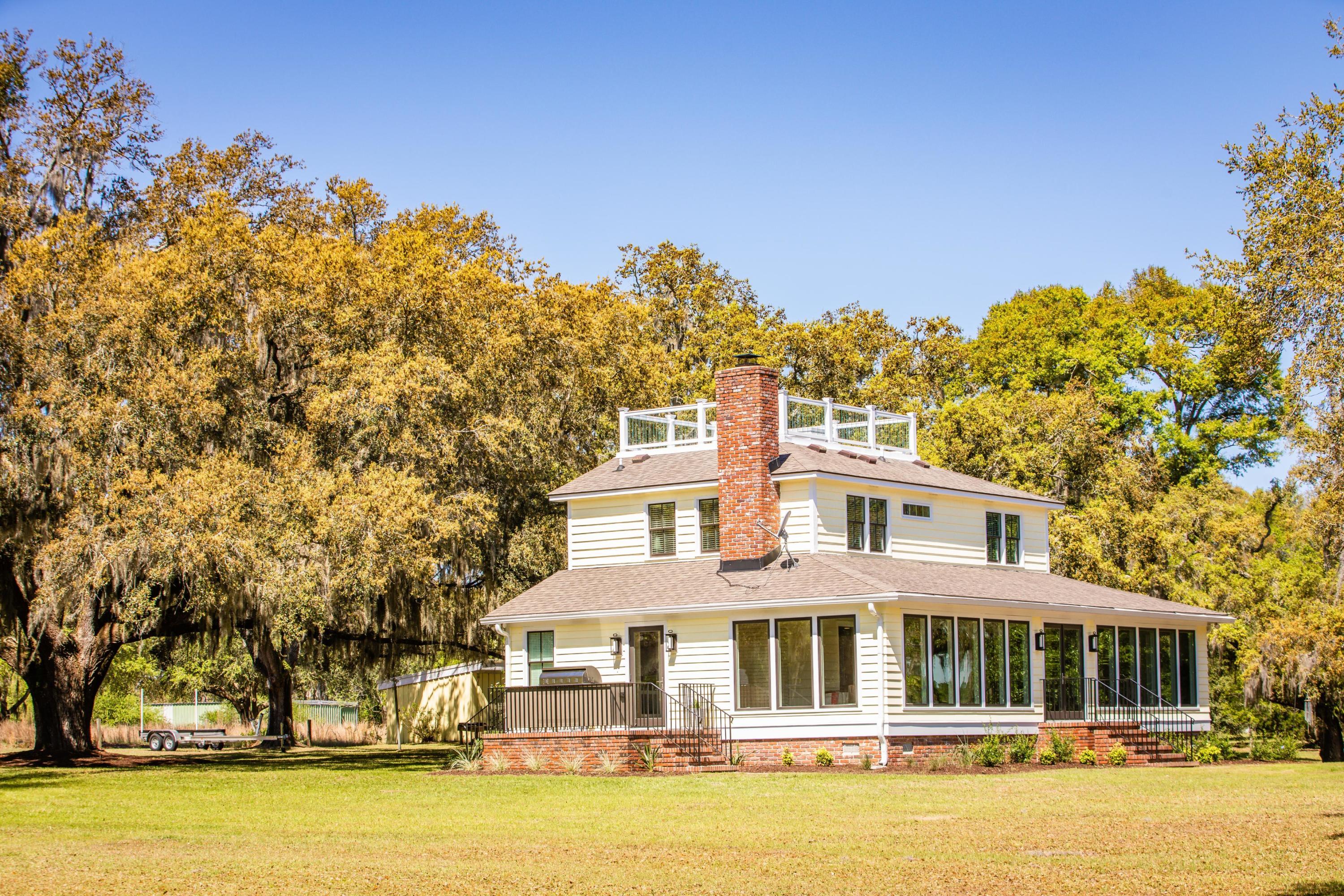 6196 Rockefeller Road Wadmalaw Island, SC 29487 - Photo 30 of 53 Side/Front of Home