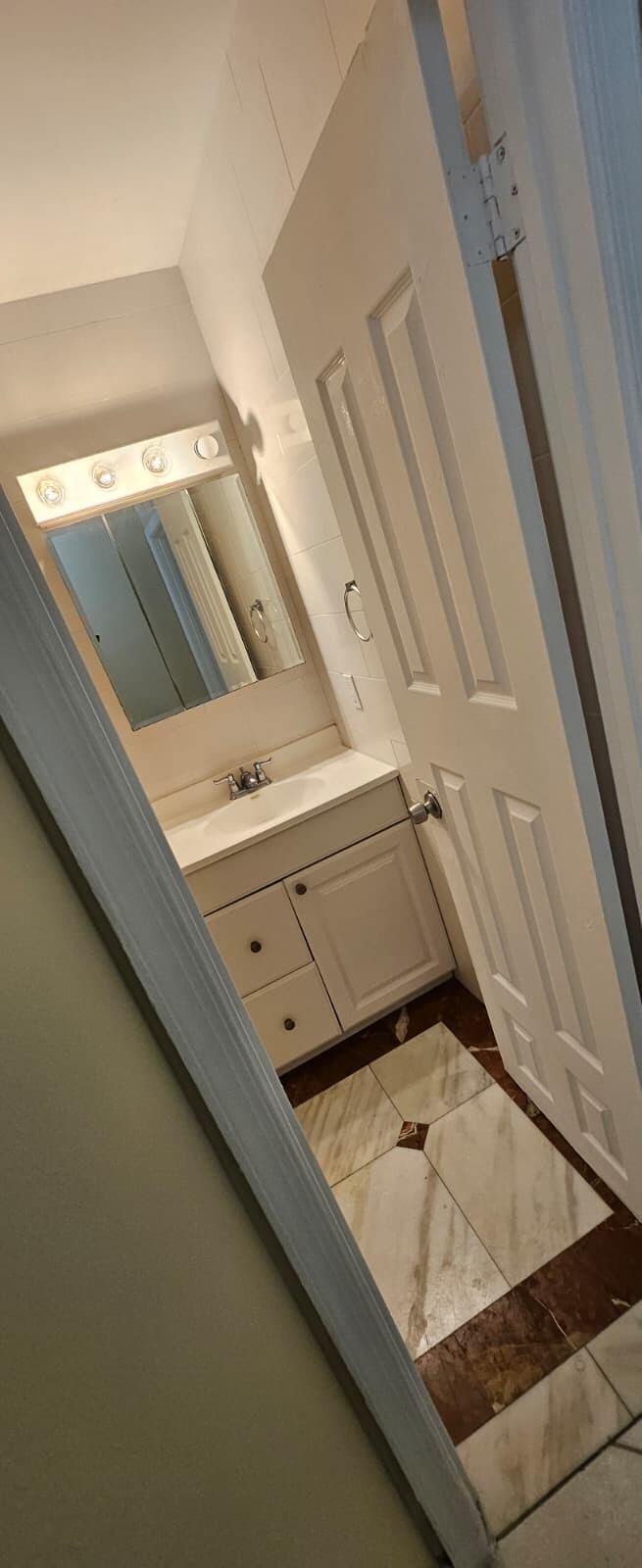 1202 Summer Street, Unit 3076 Palm Springs, FL 33461 - Photo 11 of 13 a view of water heater