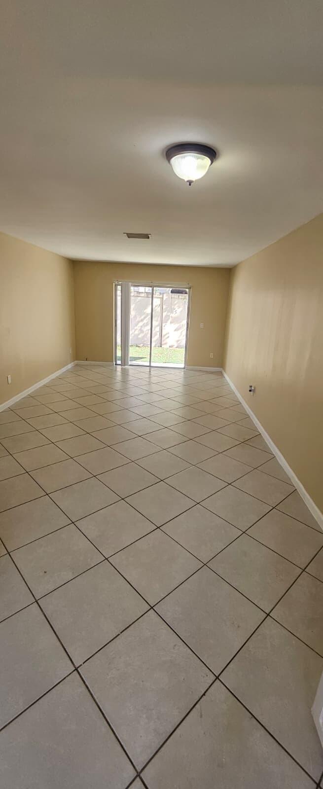 1202 Summer Street, Unit 3076 Palm Springs, FL 33461 - Photo 3 of 13 a view of empty room