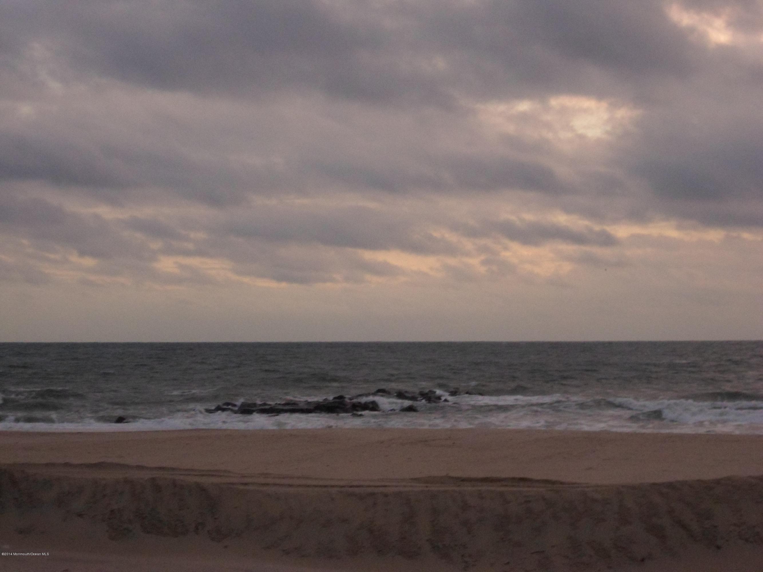 a view of beach and city