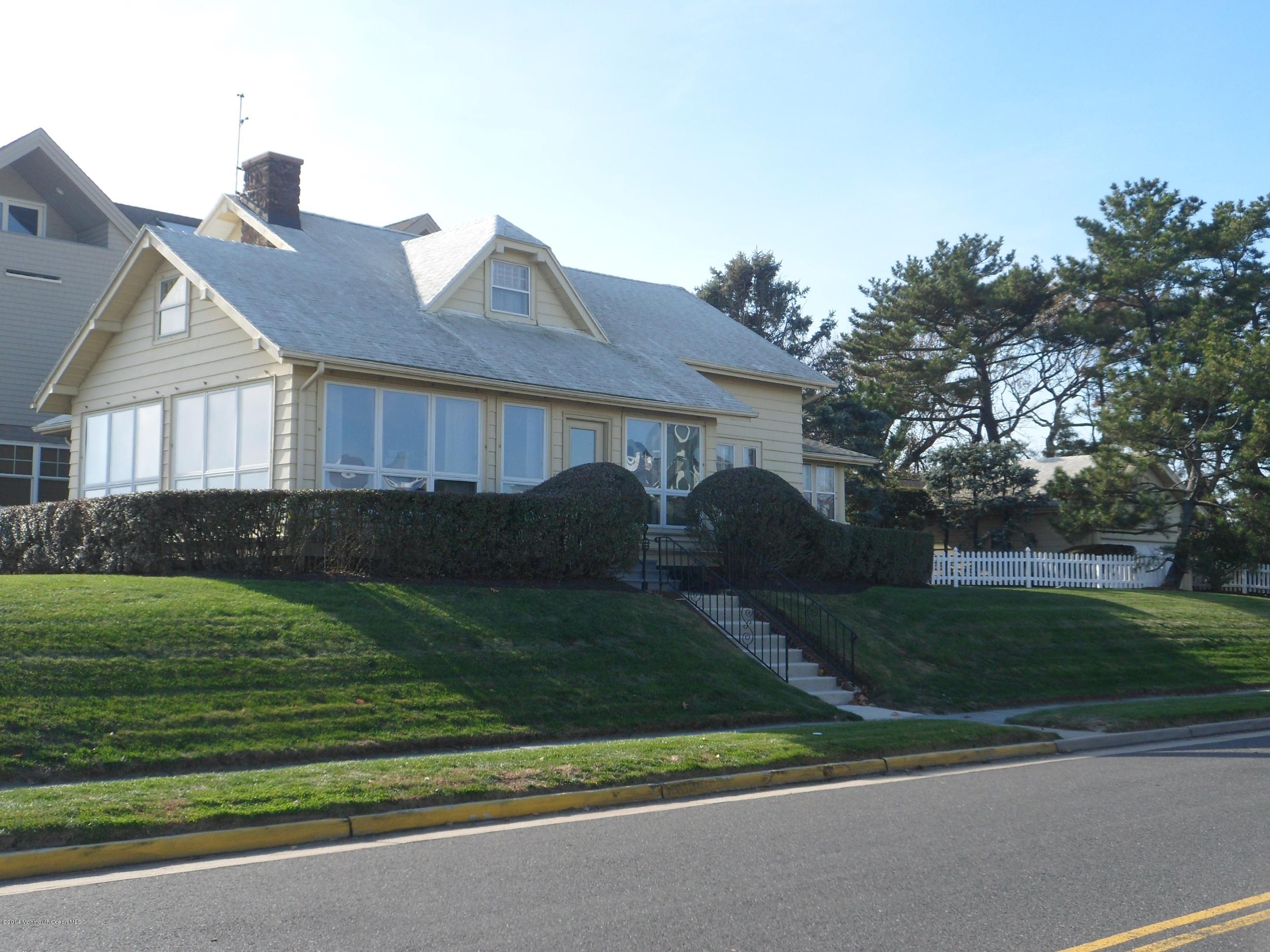 2011 North Ocean Avenue Spring Lake, NJ 07762 - Photo 2 of 6 a view of a yard in front view of a house